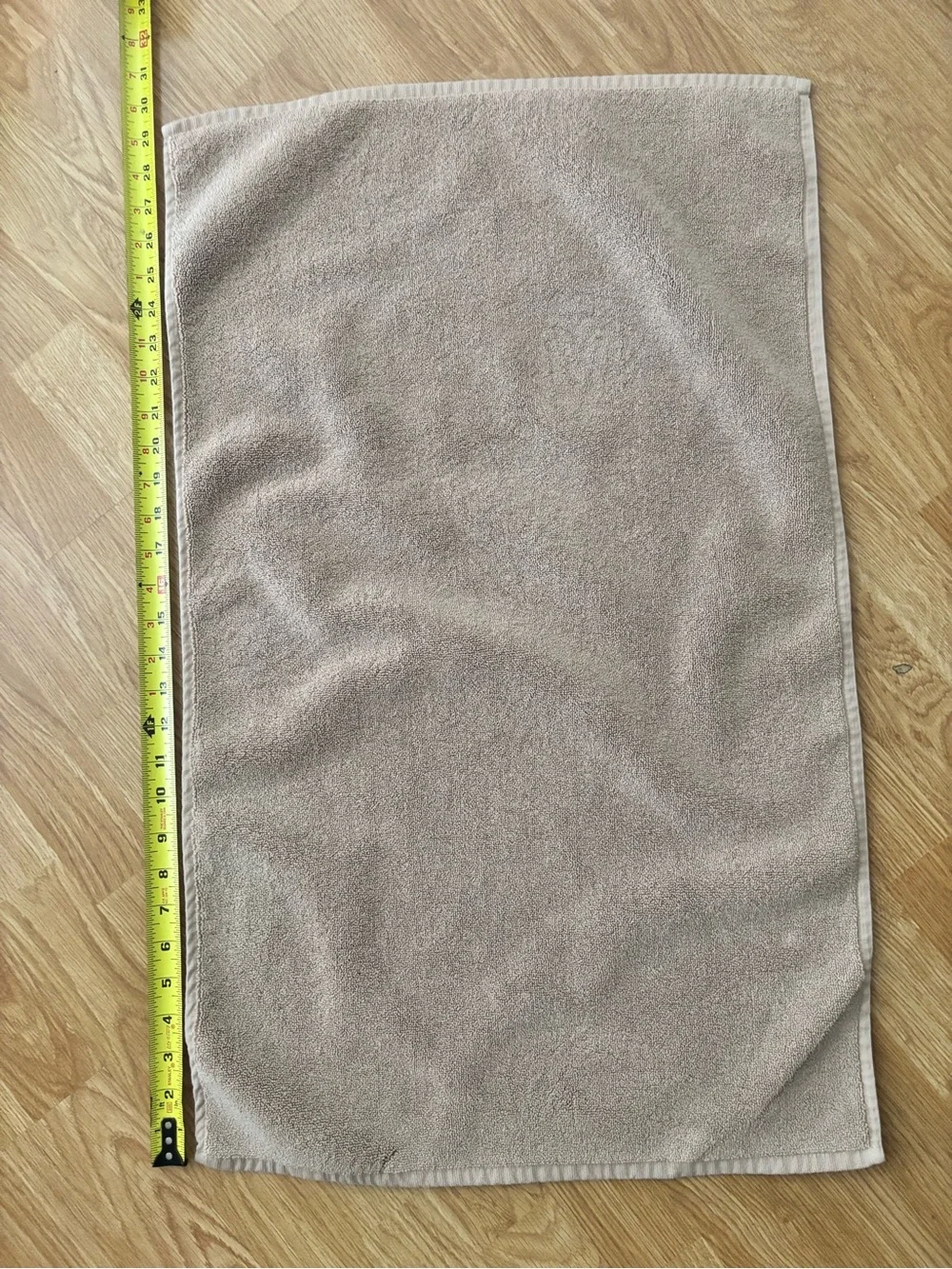 Neutral beige bath rug